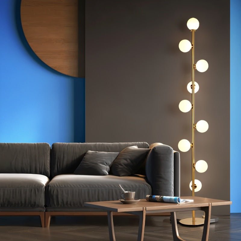 Domena Floor Lamp by Residence Supply with sleek metal stand and fabric shade, modern lighting for living room or office space.