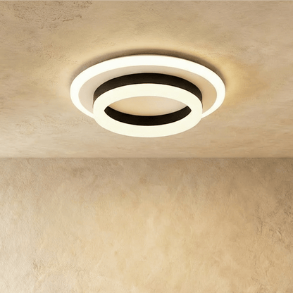Doveva ceiling light by Residence Supply, modern round fixture with a sleek white finish and illuminated diffuser.
