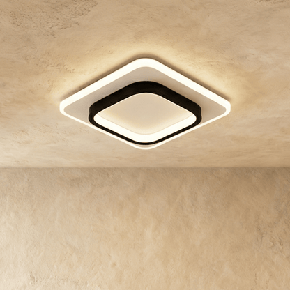 Doveva ceiling light by Residence Supply, modern round flush mount fixture with frosted glass shade and brushed metal finish.