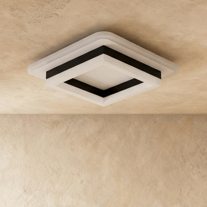 Doveva ceiling light by Residence Supply, modern round fixture with white frosted glass shade and sleek metal finish.