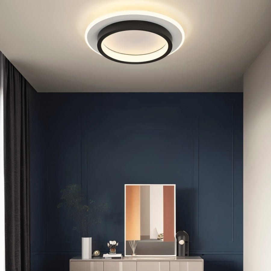 Doveva ceiling light by Residence Supply, modern fixture with white and chrome finish, mounted on a ceiling in a contemporary room.