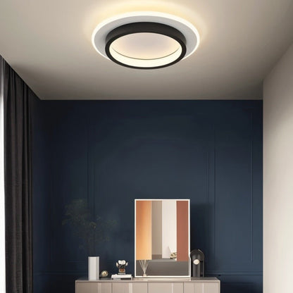 Doveva ceiling light by Residence Supply, modern fixture with white and chrome finish, mounted on a ceiling in a contemporary room.