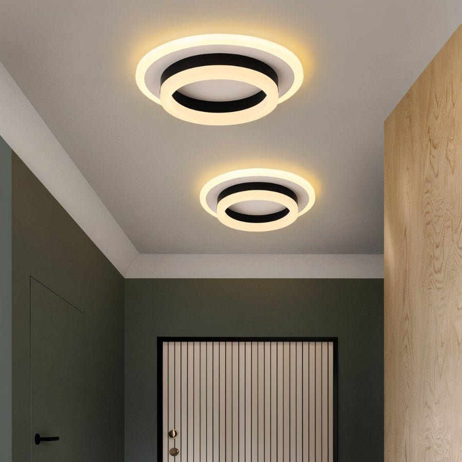 Doveva Ceiling Light by Residence Supply featuring a modern, circular design with a frosted glass diffuser and metal accents.