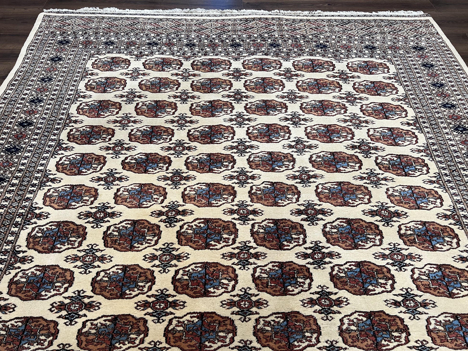 Pakistani Bokhara Rug 8x10, Traditional Turkoman Tribal Carpet, Allover Repeated Elephant Foot Motif, Ivory/Cream Black Red, Vintage Handmade - Nuvé