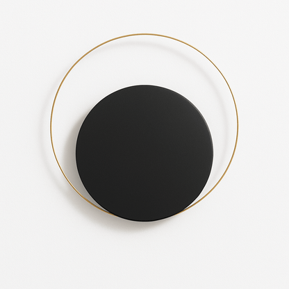 Modern Eclipse Wall Lamp by Residence Supply featuring a sleek, circular design and brushed metal finish for stylish wall lighting.