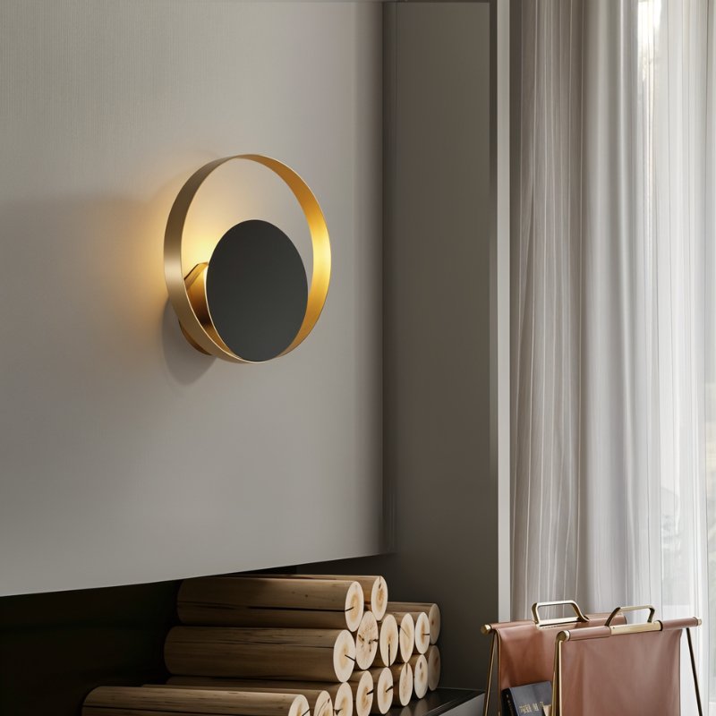Residence Supply Eclipse Wall Lamp with sleek, modern design and black finish, wall-mounted lighting fixture for contemporary spaces.