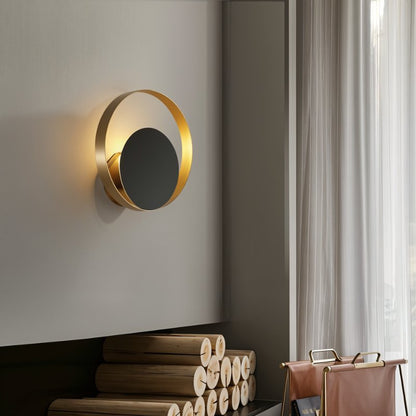 Residence Supply Eclipse Wall Lamp with sleek, modern design and black finish, wall-mounted lighting fixture for contemporary spaces.