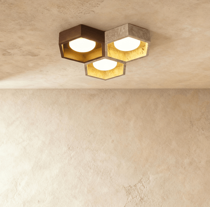 Electa ceiling lamp by Residence Supply featuring a modern design with a sleek metal finish and ambient lighting.