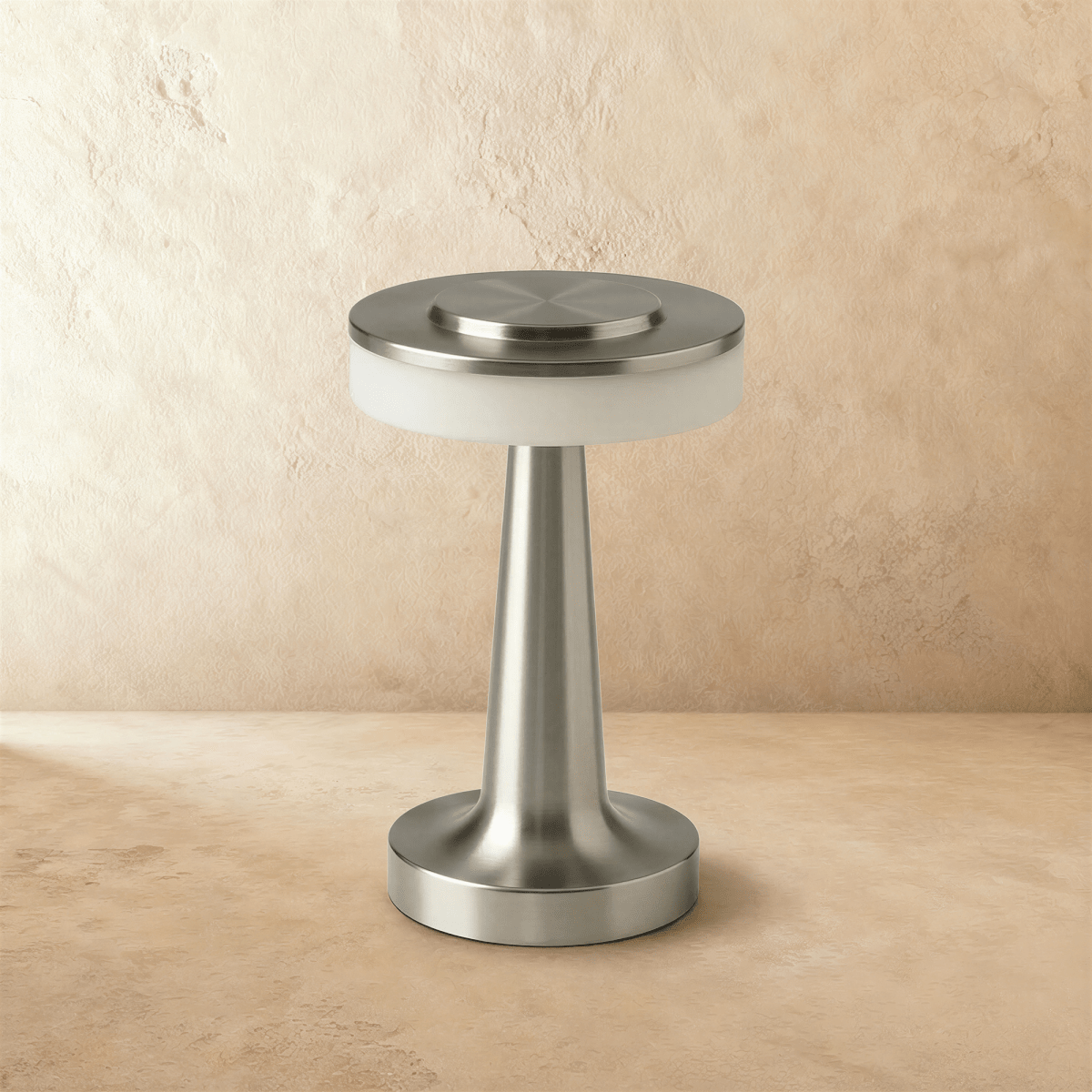 Rechargeable Ellen Table Lamp by Residence Supply with a sleek, modern design and a white lampshade on a wooden base.
