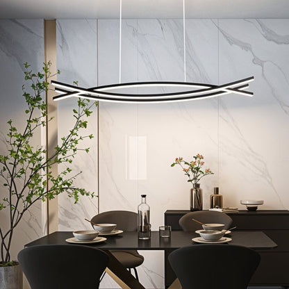 Eraj Chandelier by Residence Supply featuring multiple glass bulbs and a metal frame, hanging in a modern interior setting.