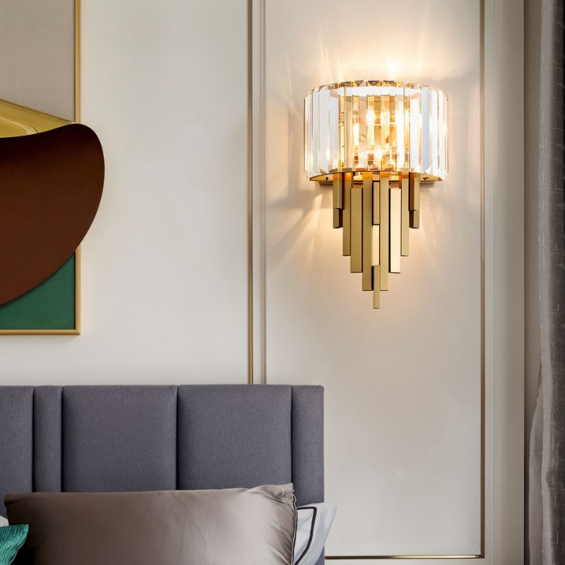 Eudora Wall Lamp by Residence Supply featuring a sleek, modern design with a curved metal arm and a glass shade for ambient lighting.