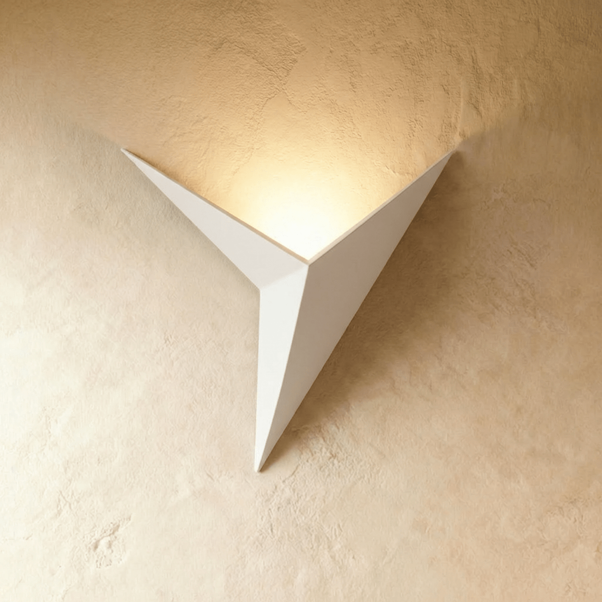 Ezio wall lamp by Residence Supply featuring a sleek design with a curved arm and modern finish, mounted on a wall.