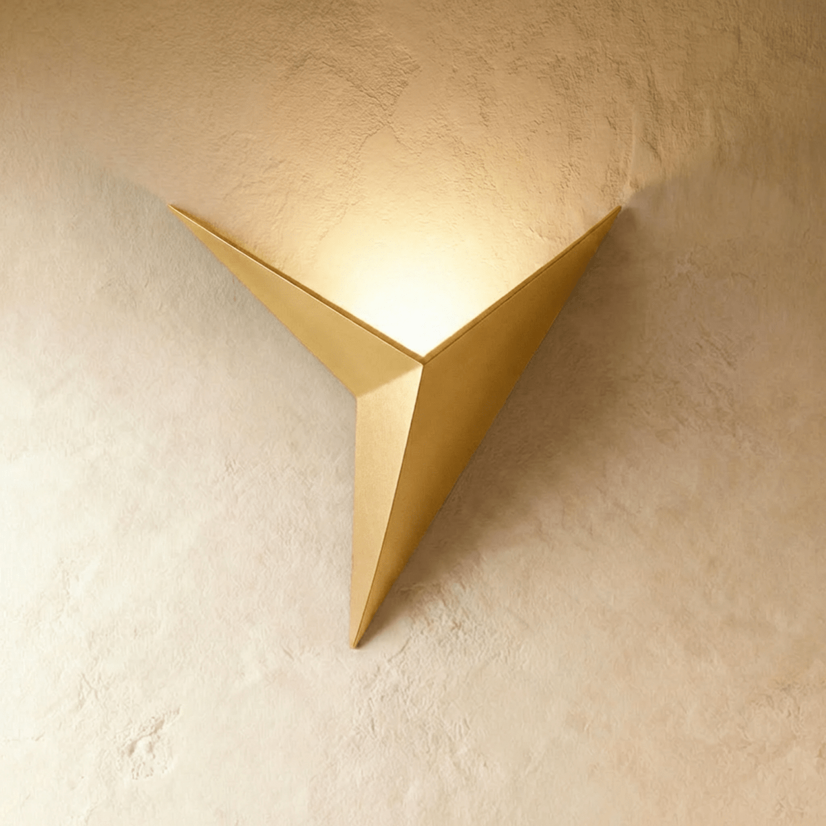Ezio Wall Lamp by Residence Supply featuring a sleek design with a metal arm and modern white shade mounted on the wall.