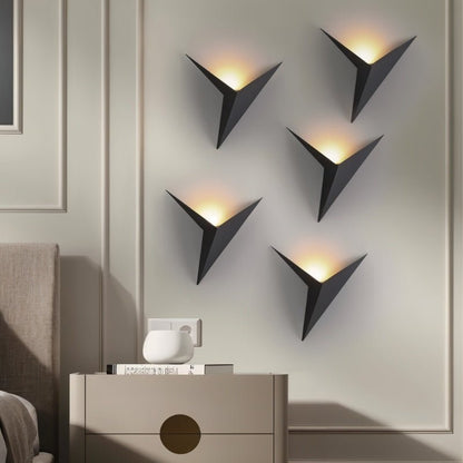 Ezio Wall Lamp from Residence Supply, featuring a sleek modern design with a metallic finish and adjustable arm.