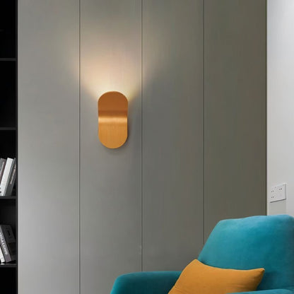 Fana Wall Lamp by Residence Supply featuring a modern design with a sleek metal finish and adjustable arm for indoor lighting.