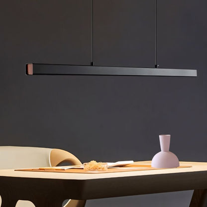 Modern Faven Pendant Light by Residence Supply with a sleek design and metal finish hanging from the ceiling.