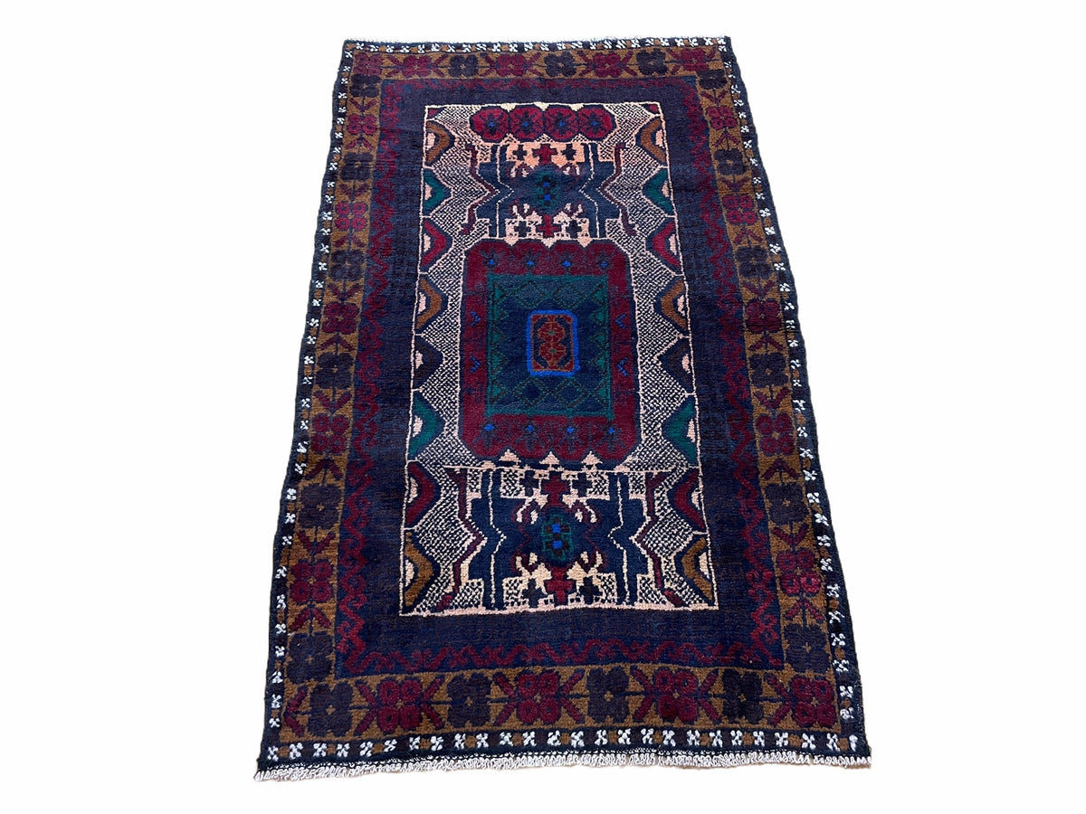 Three 5x3 vintage handmade tribal wool rugs featuring red and beige Balouchi Afghan designs by Jewel Rugs.
