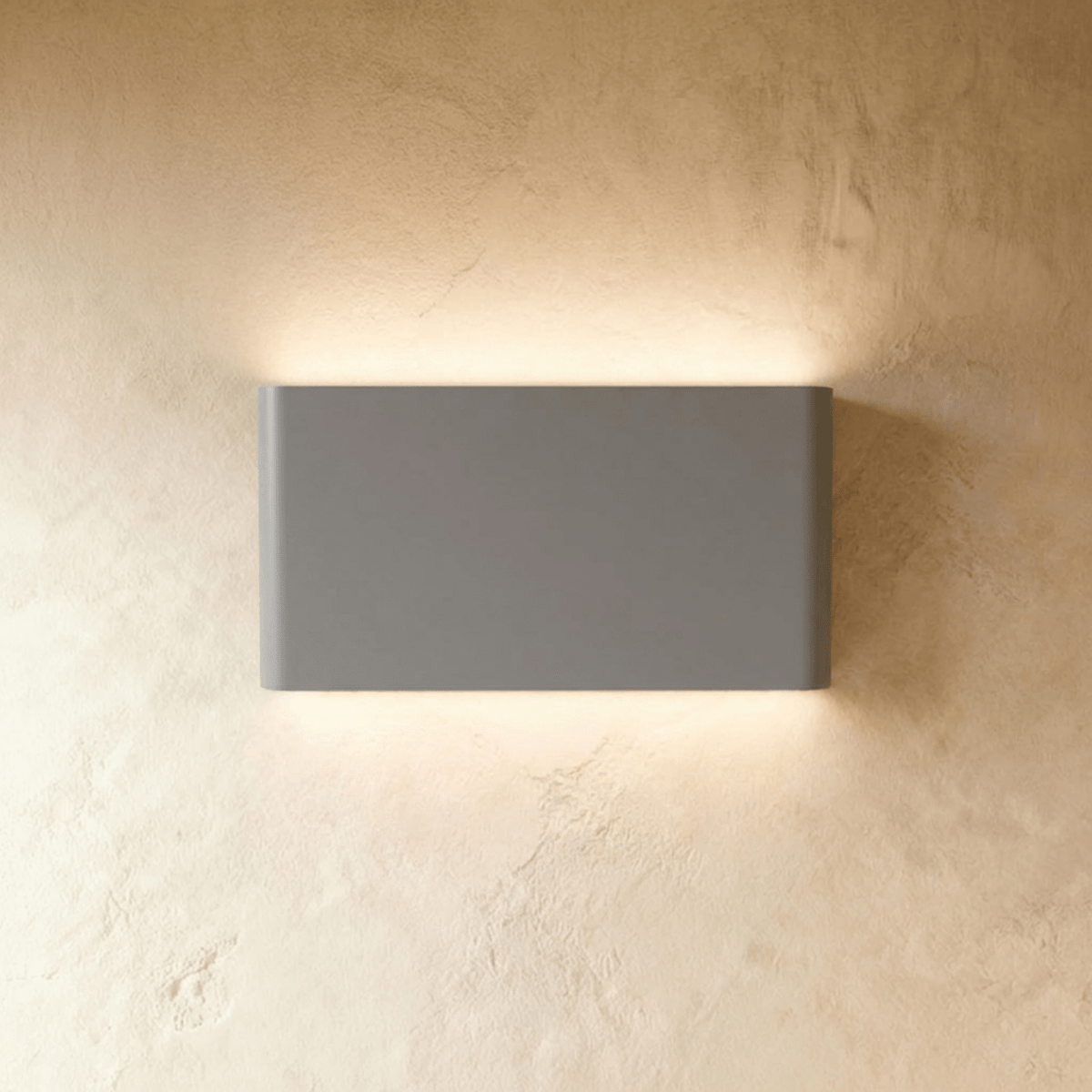 Modern Femi Wall Lamp by Residence Supply featuring a sleek design with a white shade and metallic arm for ambient lighting.