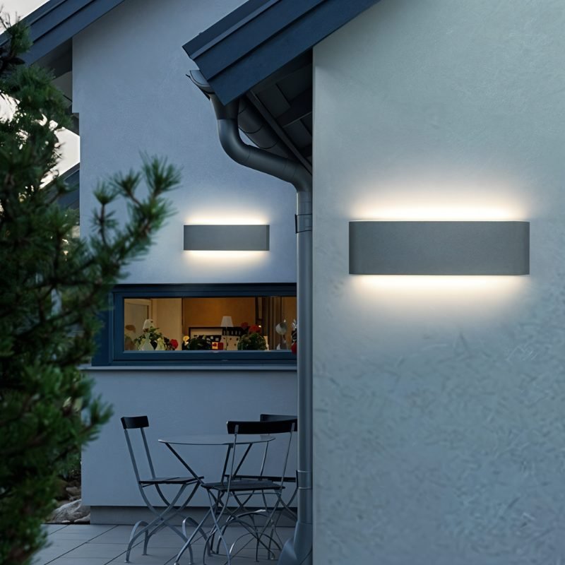 Femi Wall Lamp by Residence Supply, modern wall-mounted light fixture with sleek design and white finish.