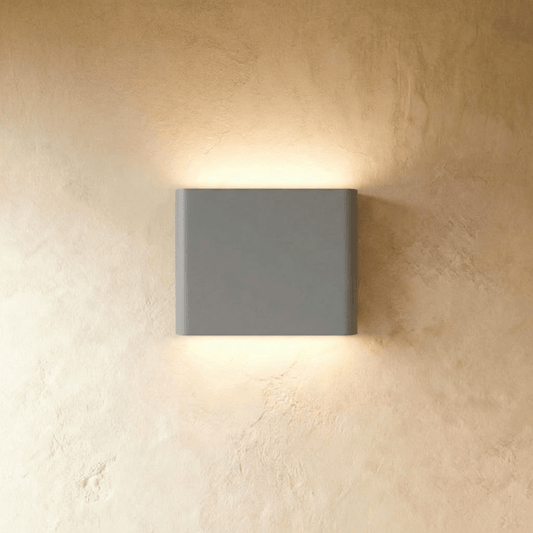 Femi Wall Lamp by Residence Supply, modern wall-mounted light fixture with a sleek design and neutral finish.