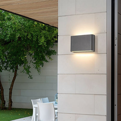 Femi Wall Lamp by Residence Supply featuring modern design with a sleek metal finish and adjustable arm for versatile lighting.