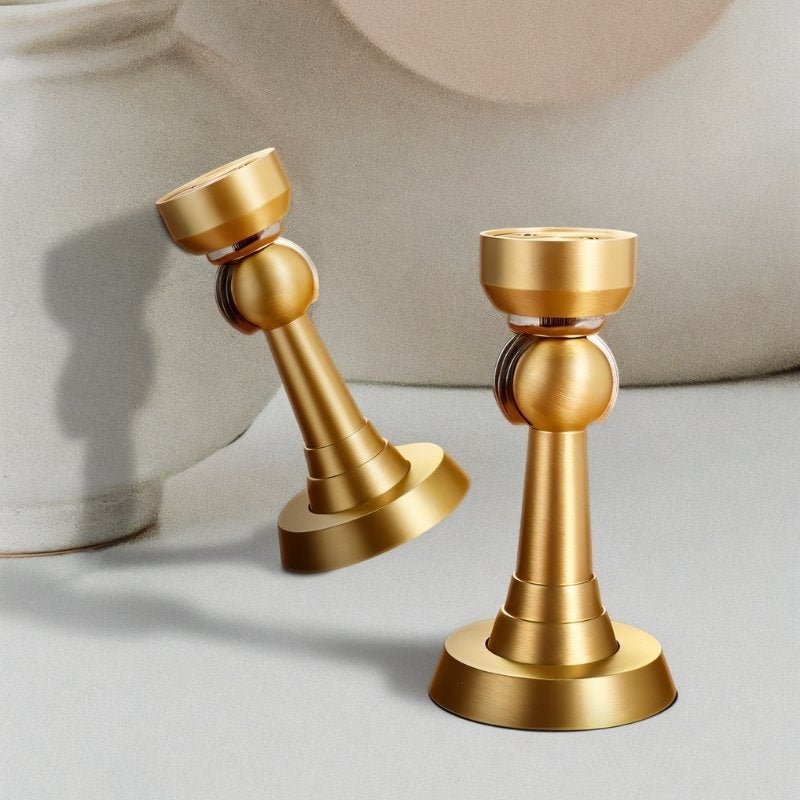 Brushed gold Figal door stop with magnetic feature from Residence Supply, designed for secure door holding in home and garden.