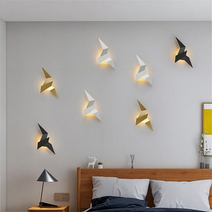 Residence Supply Finch Wall Lamp with sleek metal finish, mounted on a wall with a minimalist design and adjustable arm.