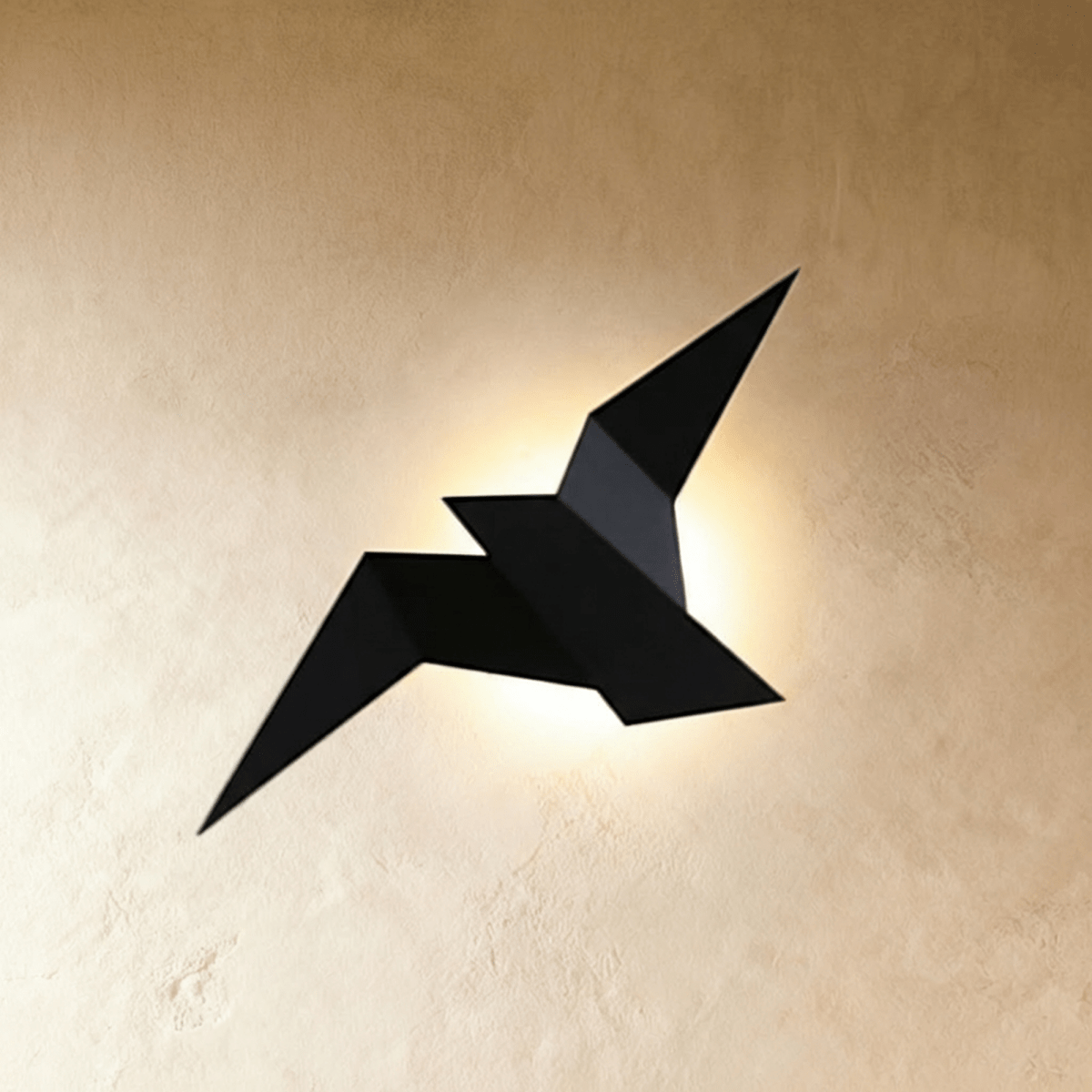 Residence Supply Finch wall lamp with a sleek, modern design featuring a metal arm and a round shade against a neutral background.