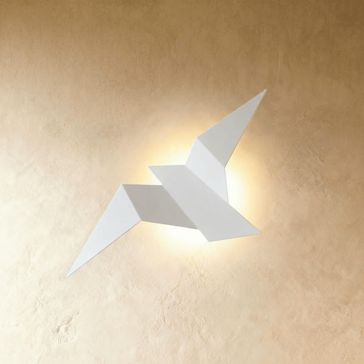 Residence Supply Finch Wall Lamp mounted on a wall with a sleek, modern design and a black finish, providing stylish ambient lighting.