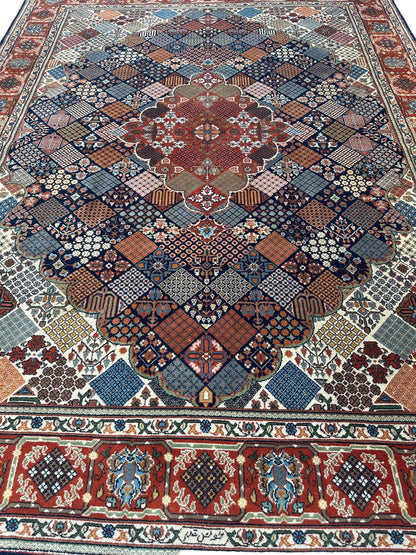 Hand-Knotted Indo-Joshegan Wool Rug – 12'2" x 9'1" – Geometric Medallion Design, Rich Warm Palette - Nuvé