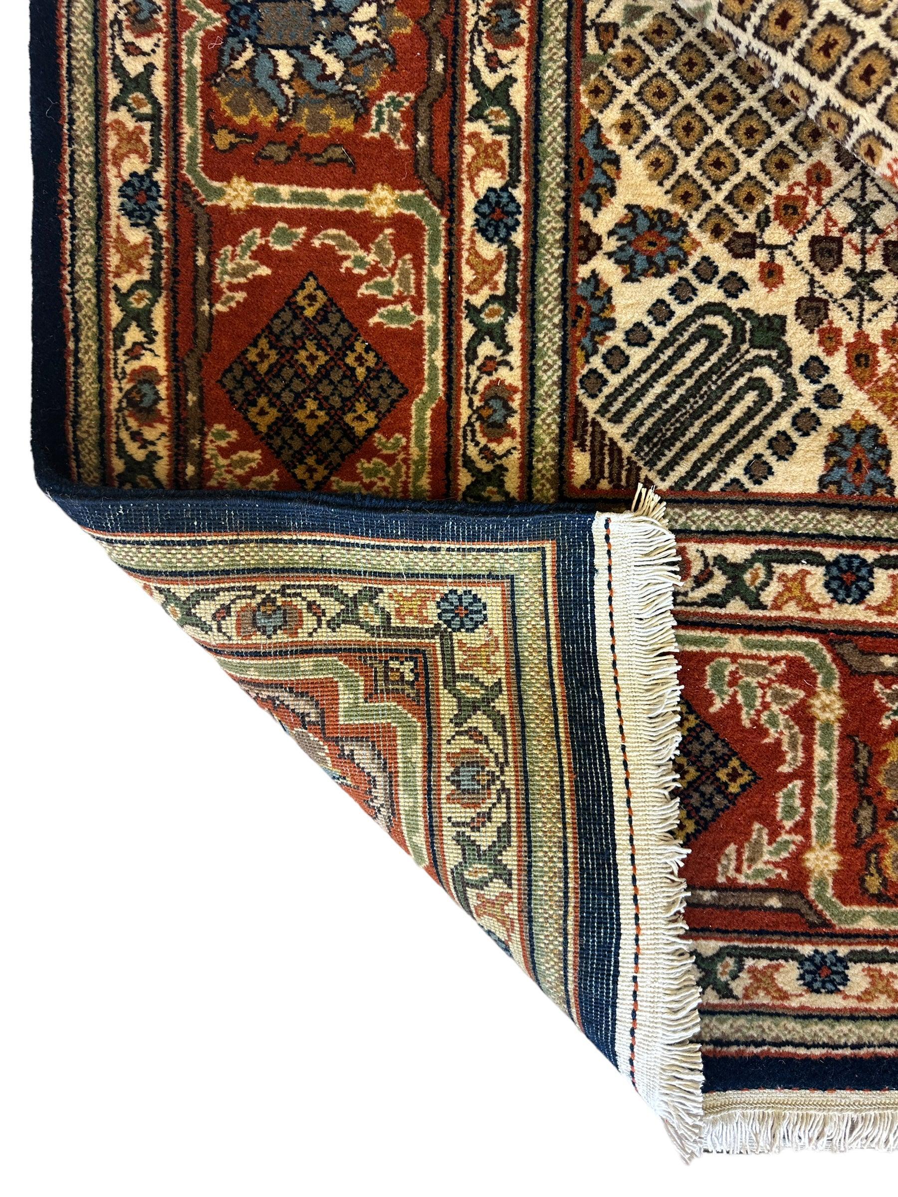 Hand-Knotted Indo-Joshegan Wool Rug – 12'2" x 9'1" – Geometric Medallion Design, Rich Warm Palette - Nuvé