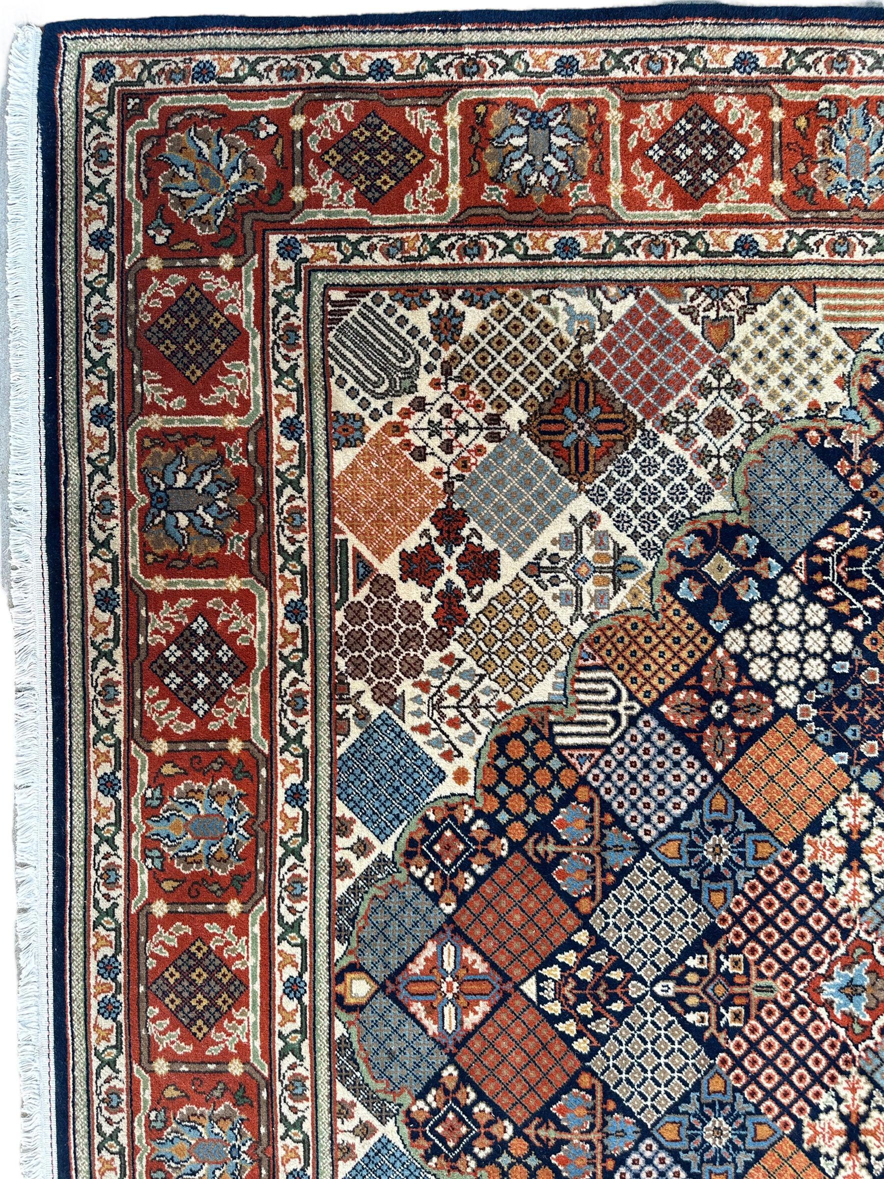 Hand-Knotted Indo-Joshegan Wool Rug – 12'2" x 9'1" – Geometric Medallion Design, Rich Warm Palette - Nuvé