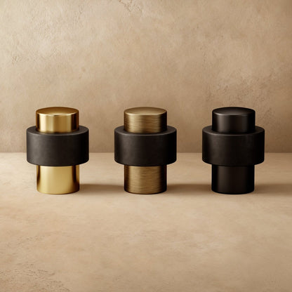 Residence Supply Finio door stop mounted on a wall, made of durable material, designed to prevent door handle damage in home and garden spaces.