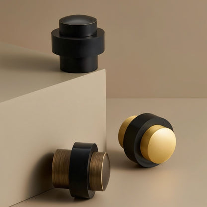 Residence Supply Finio Door Stop, sleek metal door hardware for preventing door damage in home and garden spaces.