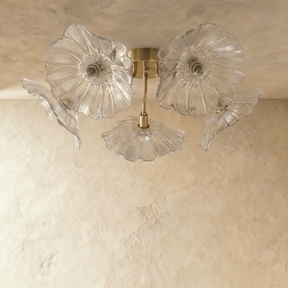 Residence Supply Floare ceiling light fixture with floral design, featuring a white glass shade and decorative metal accents.