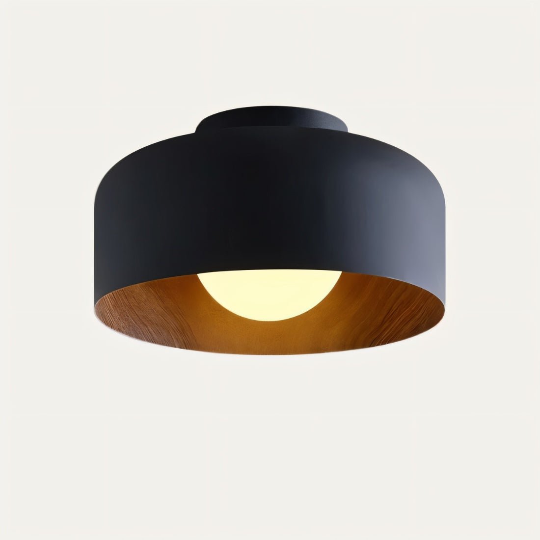 Modern Folkio ceiling light by Residence Supply with a sleek, minimalist design and warm ambient lighting.