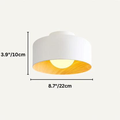 Folkio ceiling light by Residence Supply featuring a modern design with a sleek metal finish and a circular shape.