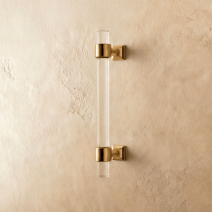 A clear image of a Frada acrylic knob and pull bar from Residence Supply, used as cabinet hardware in home and garden decor.