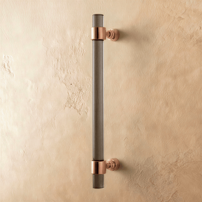 A clear image of a Frada acrylic knob and pull bar by Residence Supply for cabinet hardware in a home and garden setting.