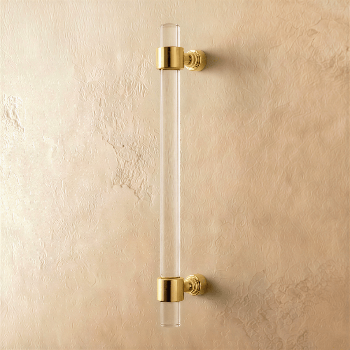 A clear image of a Frada acrylic knob and pull bar from Residence Supply, used as cabinet hardware in home and garden decor.