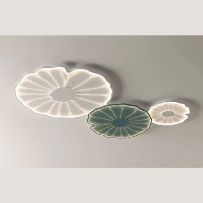 Fyntor ceiling light by Residence Supply featuring a modern, sleek design with a round white shade and metal accents.