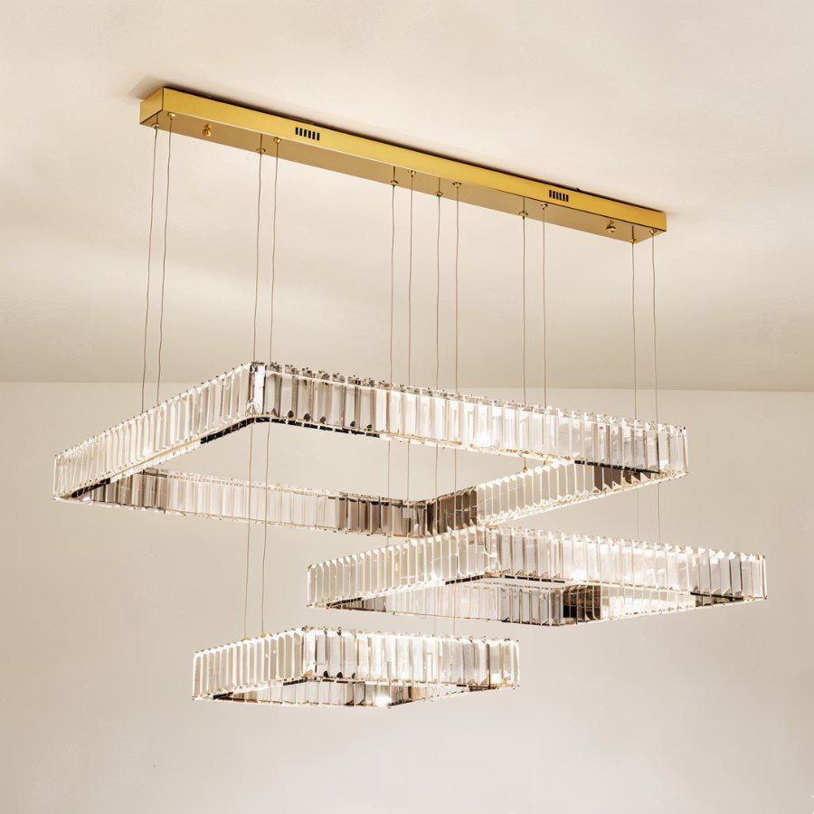 Elegant Gerel Chandelier by Residence Supply with multiple light fixtures and intricate metal detailing for stylish interior lighting.