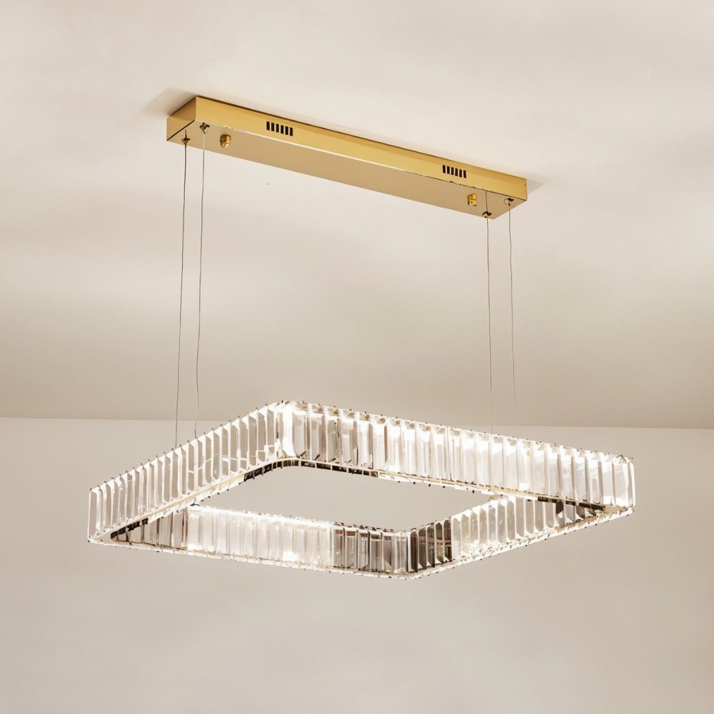 Elegant Gerel chandelier by Residence Supply with multiple light bulbs and intricate metal detailing, hanging from a ceiling fixture.