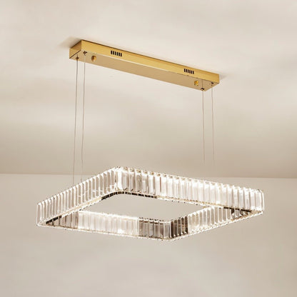 Elegant Gerel chandelier by Residence Supply with multiple light bulbs and intricate metal detailing, hanging from a ceiling fixture.