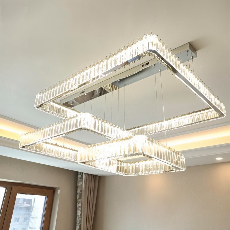 Elegant Gerel chandelier by Residence Supply with intricate metalwork and multiple light fixtures hanging from a decorative frame.