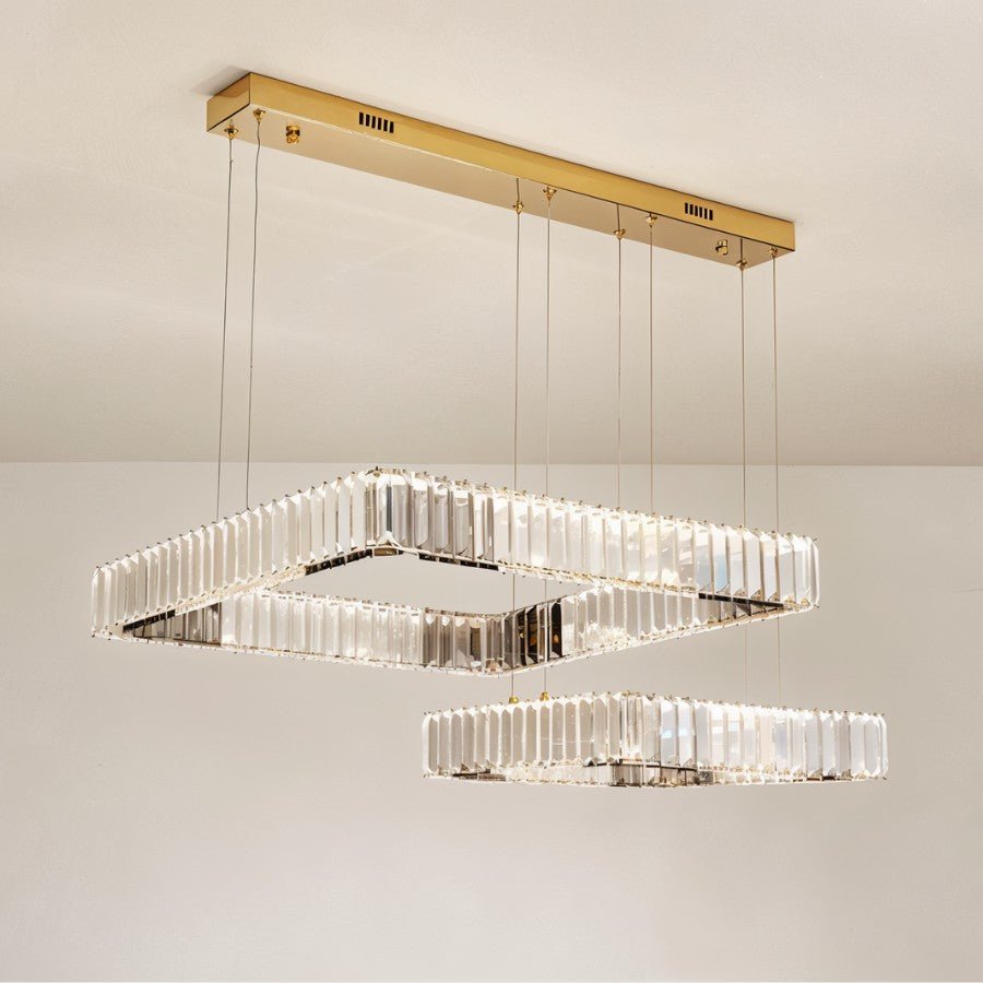 Gerel chandelier by Residence Supply featuring multiple glass sconces and intricate metal details, hanging from a ceiling mount.