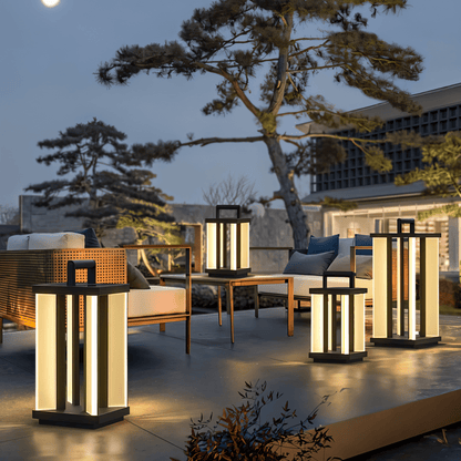 Residence Supply Gloza Outdoor Lamp with clear glass and black metal frame, ideal for garden or patio lighting.
