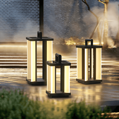 Residence Supply Gloza Outdoor Lamp illuminated with clear glass and black metal frame, suitable for garden or patio lighting