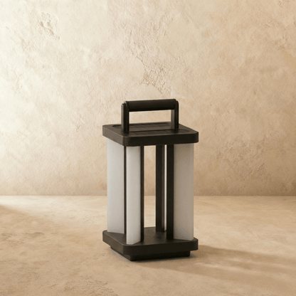 Residence Supply Gloza outdoor lamp with modern design, featuring a sleek metal frame and glass enclosure for outdoor lighting.