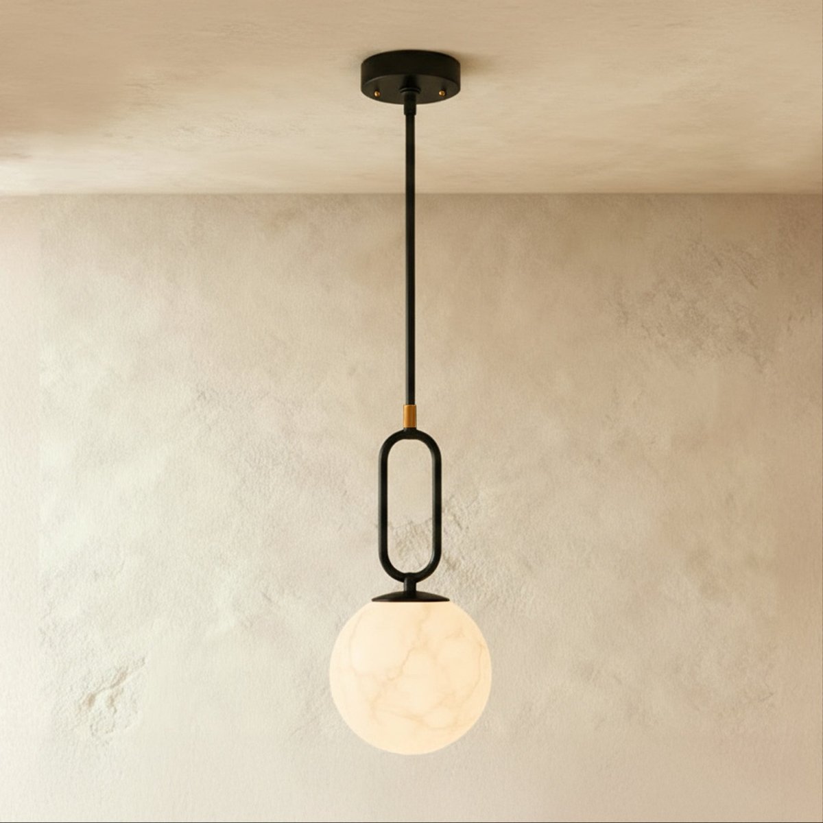 Alabaster pendant light with gong-shaped design by Residence Supply, featuring smooth, translucent stone material and modern style.